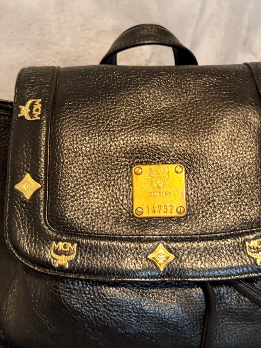MCM Black Leather Backpack with Gold Logo Accents - Picture 3 of 11
